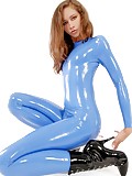 Princess Fatale in blue latex catsuit and black boots